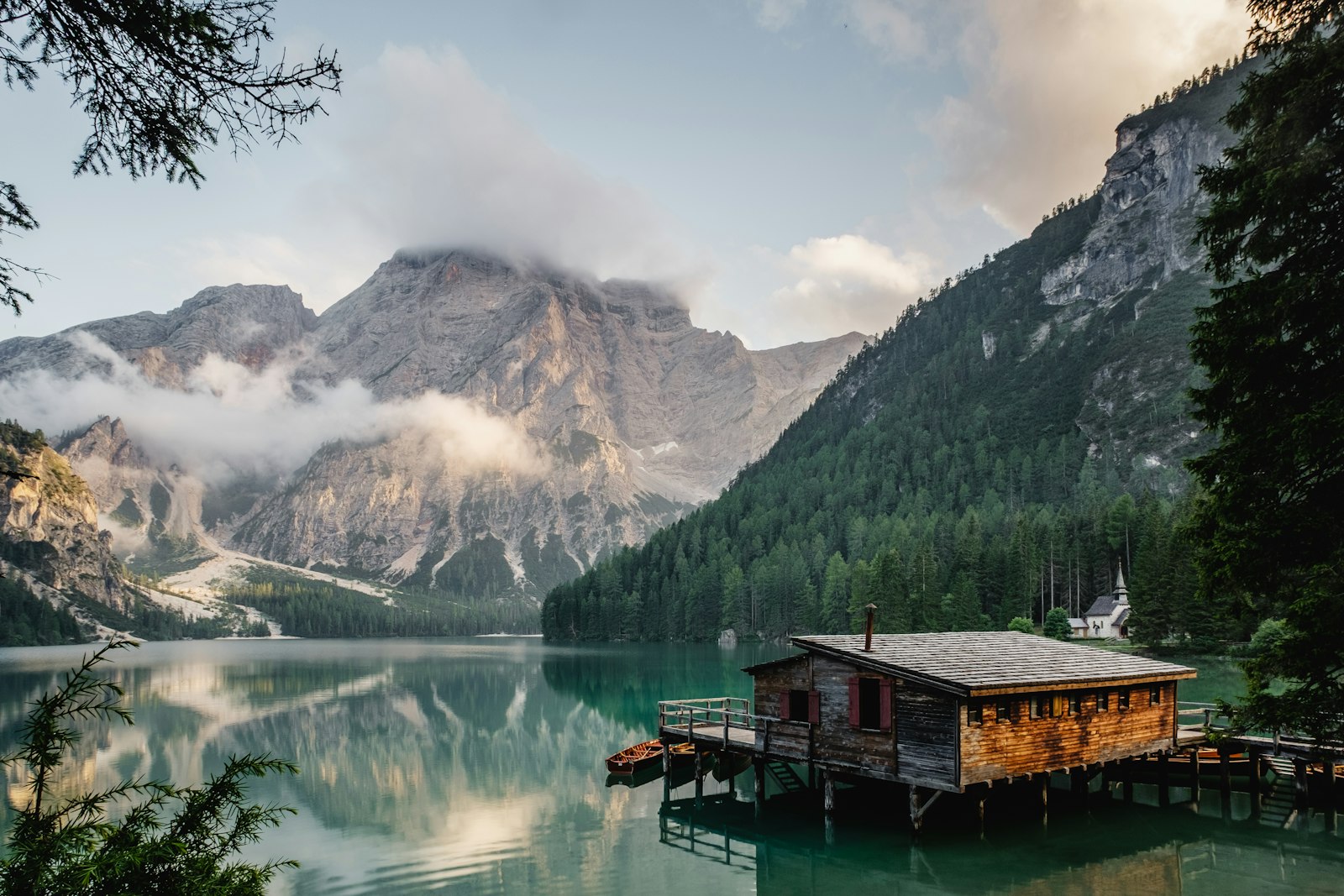 Sunset light over lake and mountains